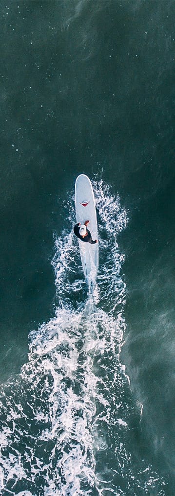 Riding Stillness: Surfing the Line Between Control and Chaos
